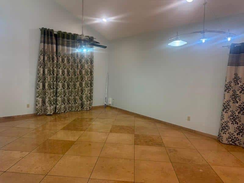 Breasy scoping a compact tract-home turnover in Chandler, AZ