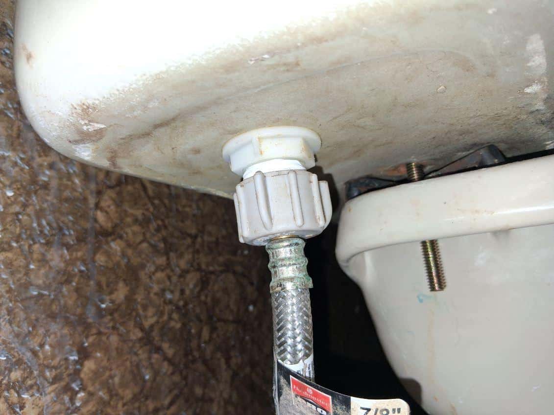 Diagnosing a plumbing leak under a sink in a Scottsdale rental