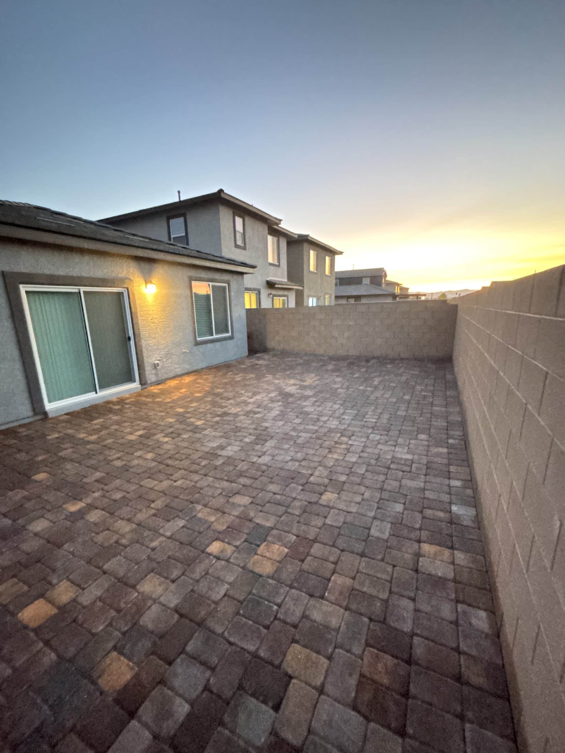 Completed paver patio installation near you at dusk